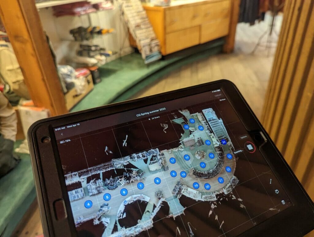 A tablet shows mapping points of a store. 